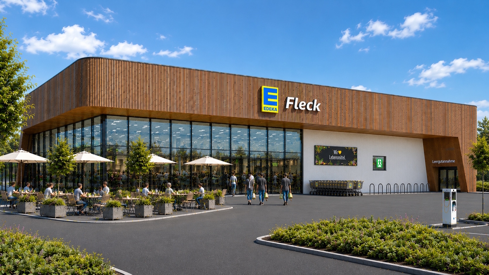 Außenansicht des geplanten EDEKA-Marktes Fleck. Einstöckiges Gebäude, verglast und im oberen Drittel eine Holzverkleidung.