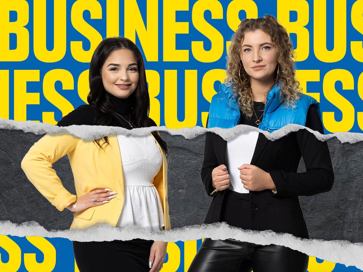 2 Azubinen aus dem Großhandel vor dem Hintergrund "Business"