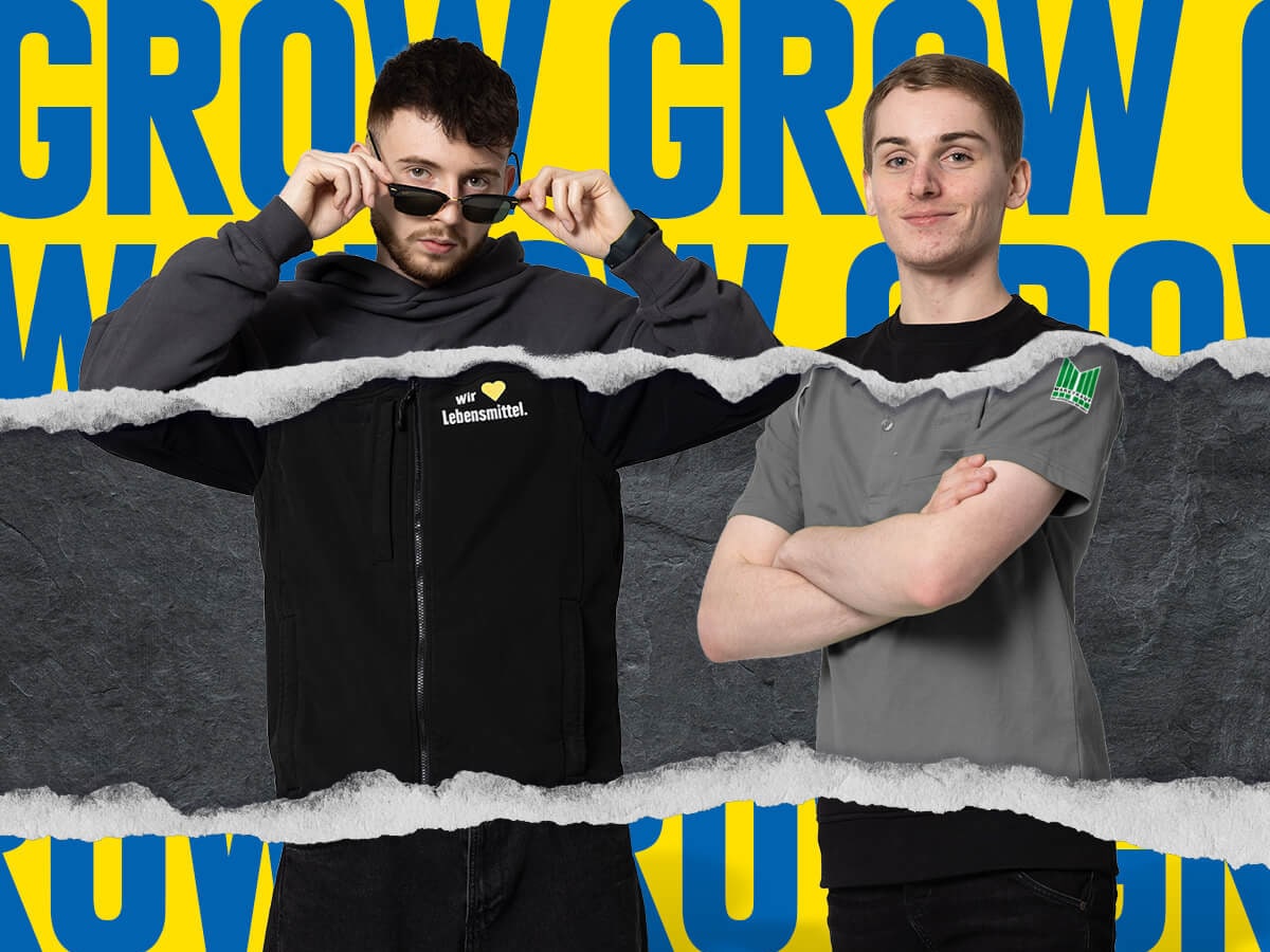 2 männliche Azubis vor dem Hintergrund "Grow"