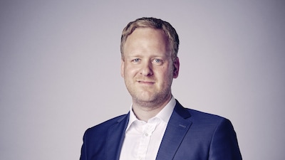 Portraitfoto von Geschäftsführer Frank Breuer