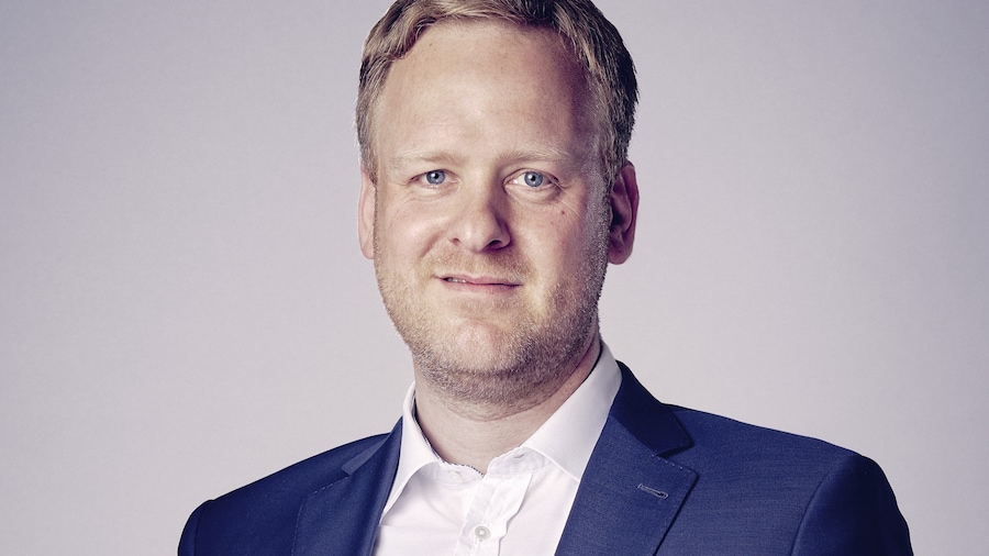 Portraitfoto von Geschäftsführer Frank Breuer