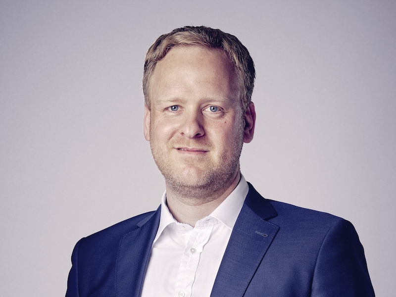 Portraitfoto von Geschäftsführer Frank Breuer