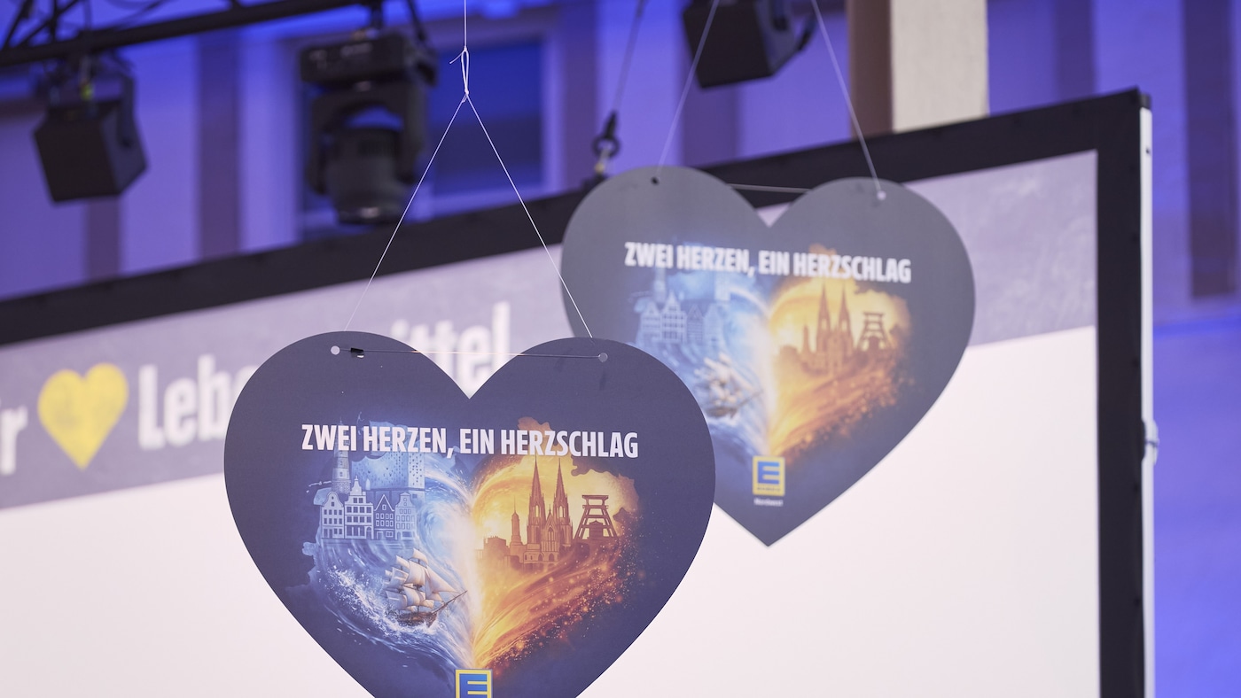 Key Visual der Allianz EDEKA Nordwest: Zwei Herzen, ein Herzschlag
