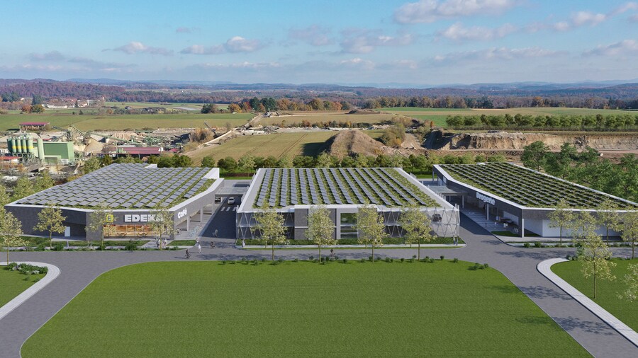 Visualisierung eines neuen, großflächigen Fachmarktzentrums, eingebettet in eine ländliche Gegend.