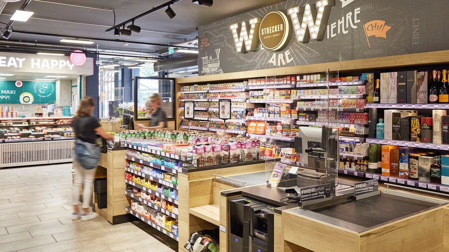 Heller Kassenbereich mit Snacks, Tabakwaren, Spirituosen und großem Wiehre-Schriftzug.